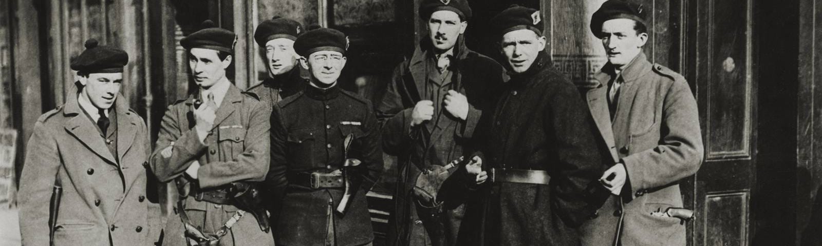 A black and white photo of paramilitary figures in 1920s Ireland