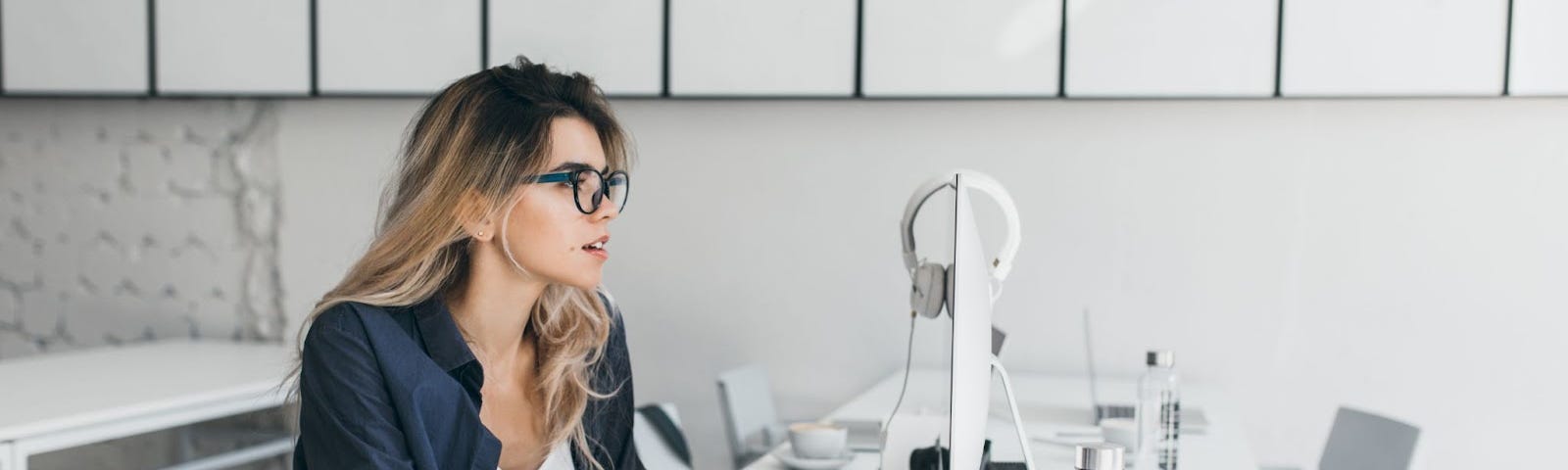 designer female working in front of computer