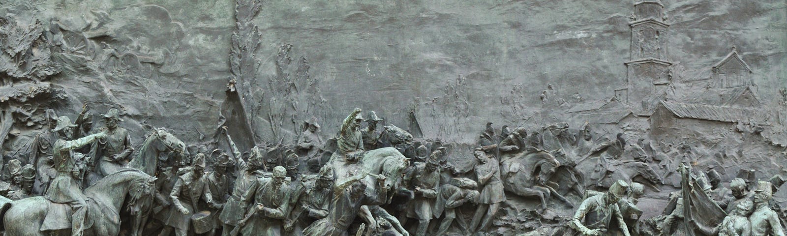 Bas-relief stone mural of revolutionary war.