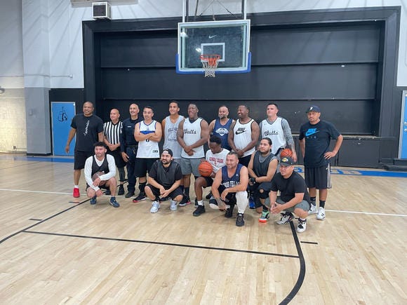 Nickerson Gardens rec center with basketball team