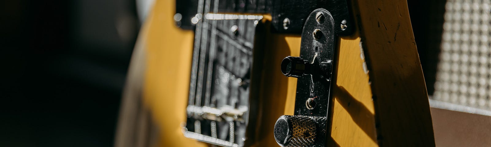 Closeup of telecaster guitar — looks like Springsteen’s