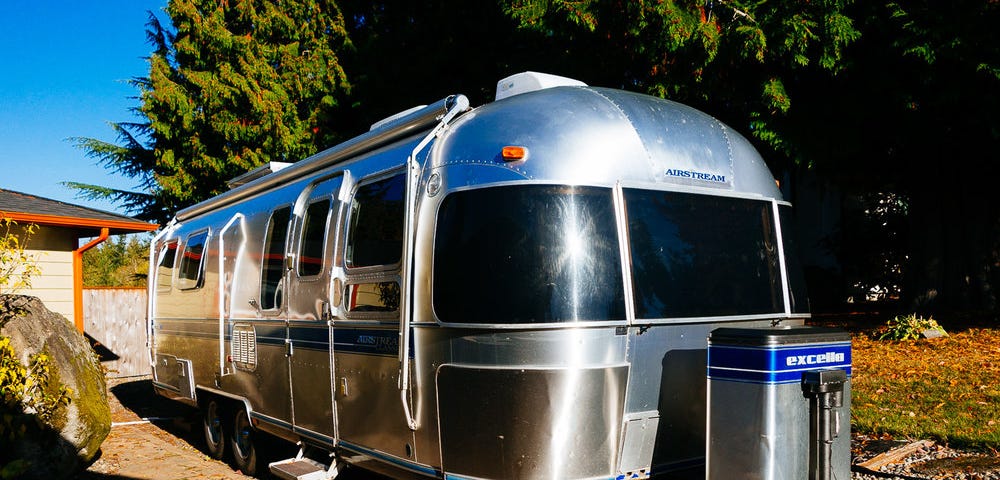 This is our second Airstream, a 1992, 29 foot. John's dad and stepmom graciously let us house it in their side yard while we did some renovations.