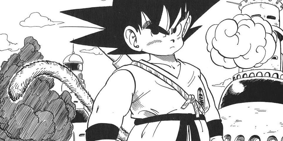 Kid Goku stands in front of a fallen Tien Shinhan, protecting him.