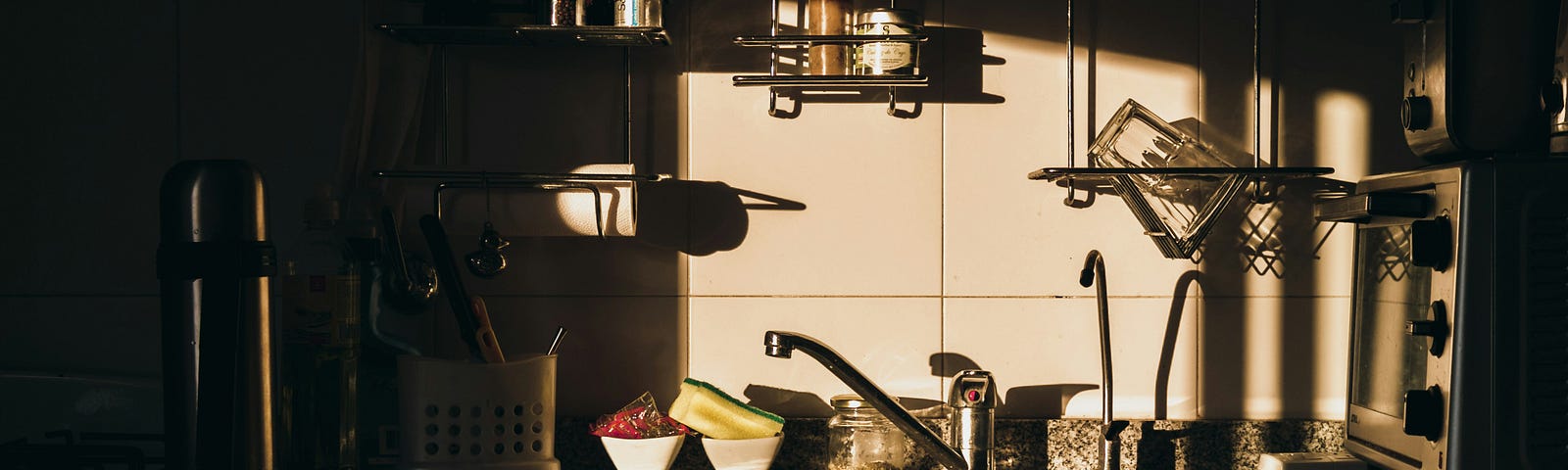 a light illuminates a kitchen counter and drawer