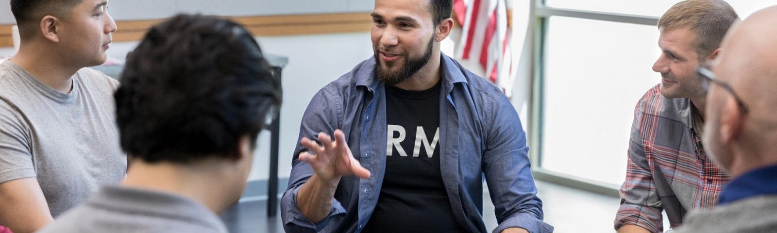 Veterans talk in group. Photo by SDI Productions/Getty Images