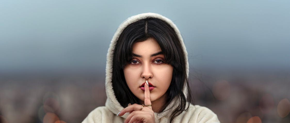 Close Up Photo of Woman Wearing Hoodie