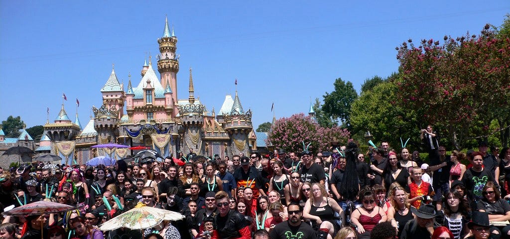 Group photo in front of the castle at Disneyland’s goth day, “Bat’s Day in the Fun Park,” August 2006.