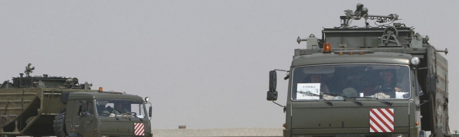 Russian trucks on the road heading to Deir al-Zor in Kabakeb near Deir al-Zor, Syria, September 21, 2017. Photo by Omar Sanadiki/Reuters