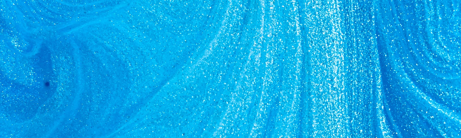 An aqua-type blue field of paint brush strokes