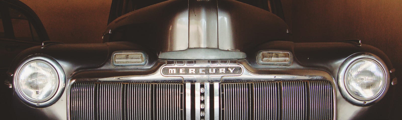 A shiny new -48 Mercury with a huge grill.