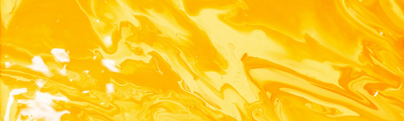 A messy splash of yellow paint.