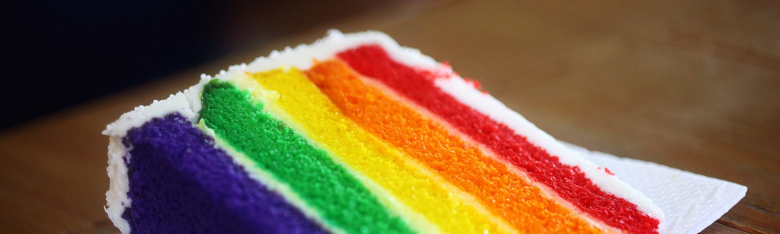 Piece of cake with rainbow layers