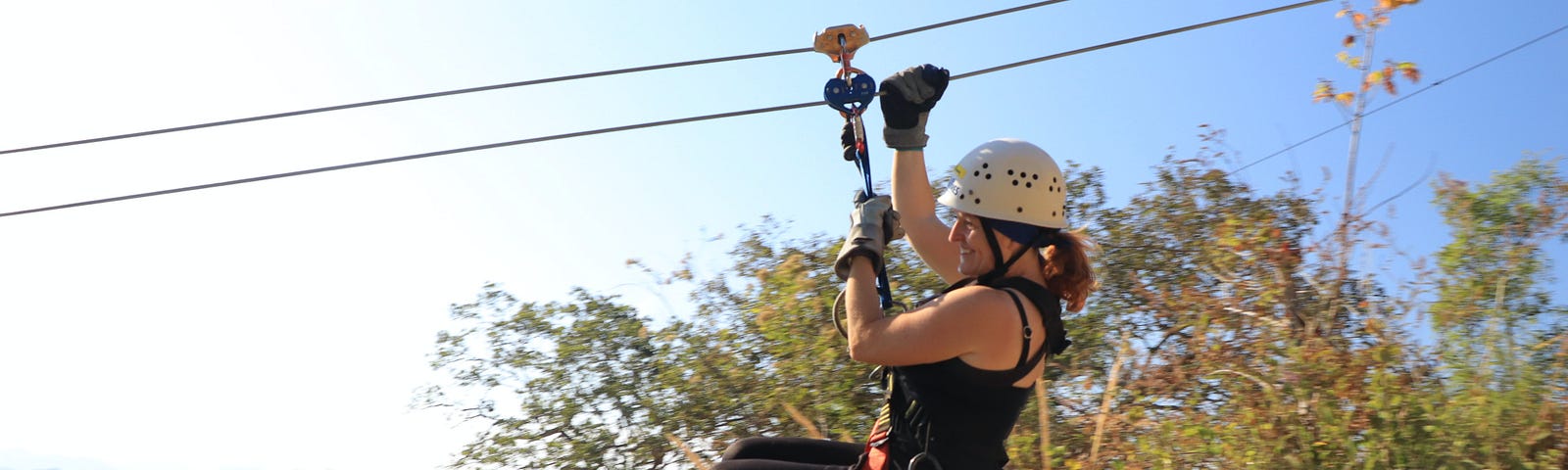 Picture of a lady ziplining