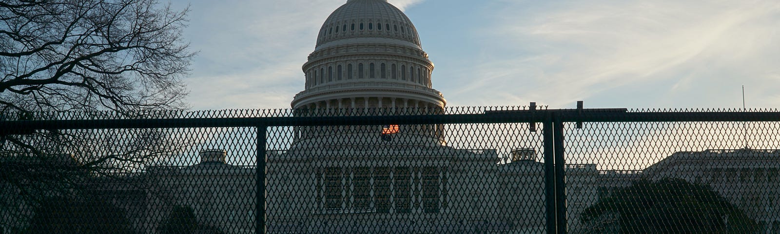 House of Representatives behind a fence wall