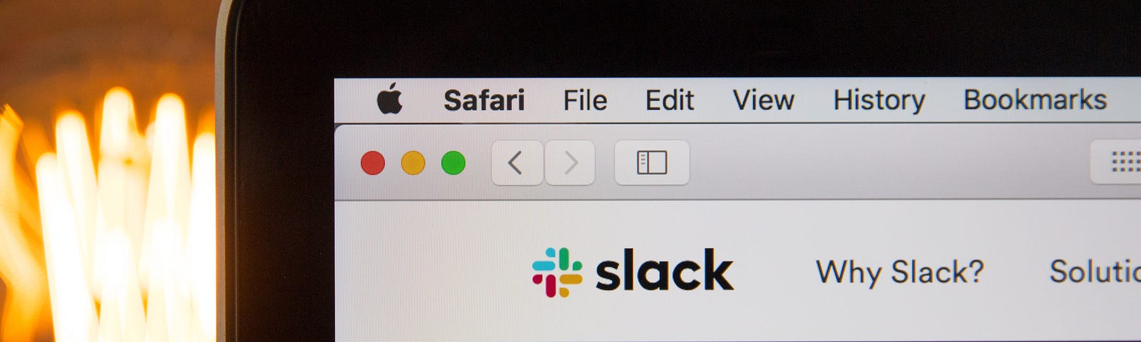 A Mac desktop with a browser window open to a slack workspace.