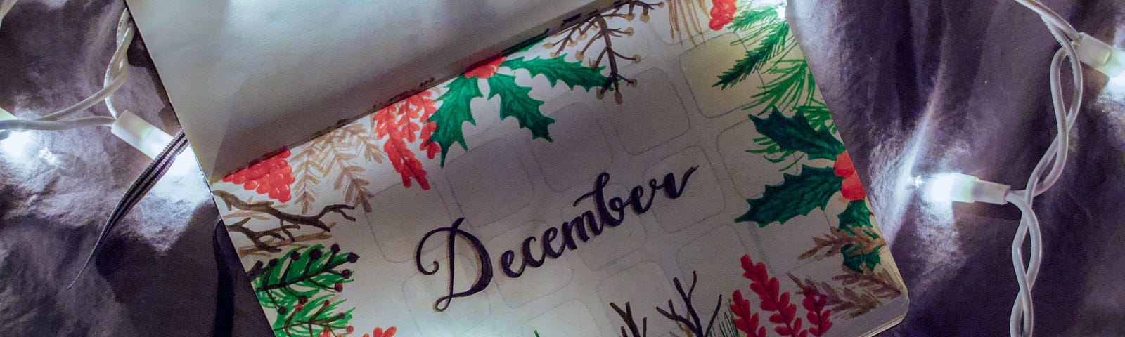 White Christmas lights and the word December.