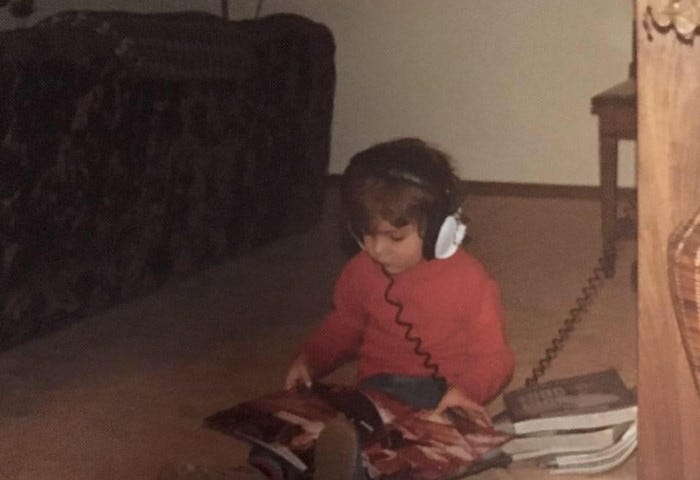 The author as a young child listening to music in the late 1970's.