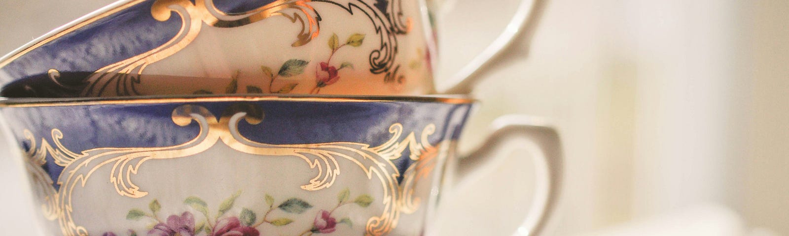 two china tea cups and saucers