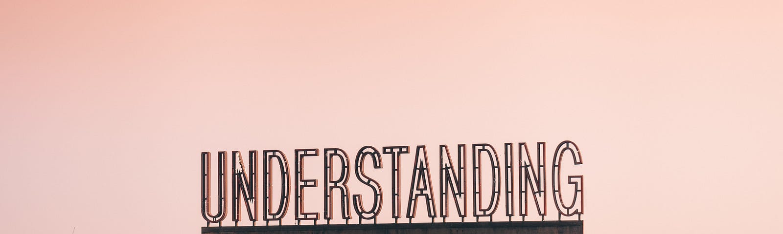 A signboard with the word “understanding”