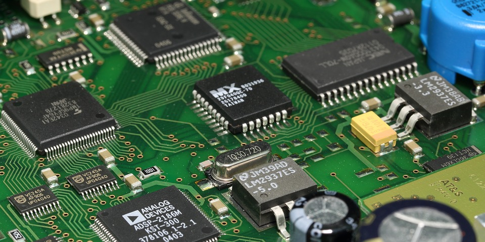 A picture of a printed circuit board populated with different componets