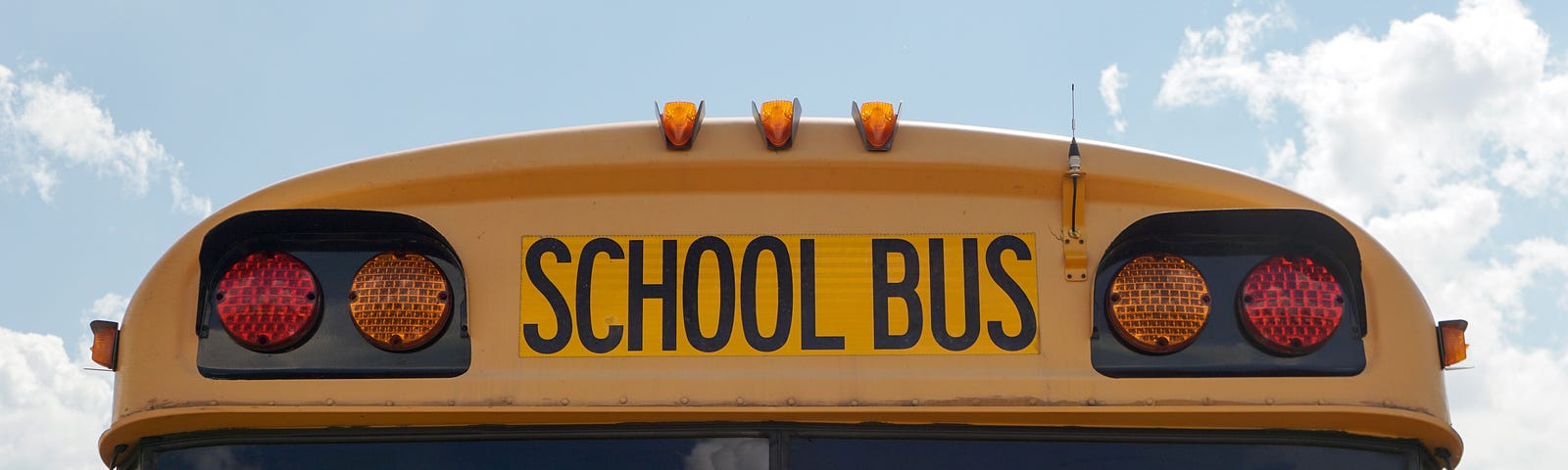 Image shows the front of a yellow school bus
