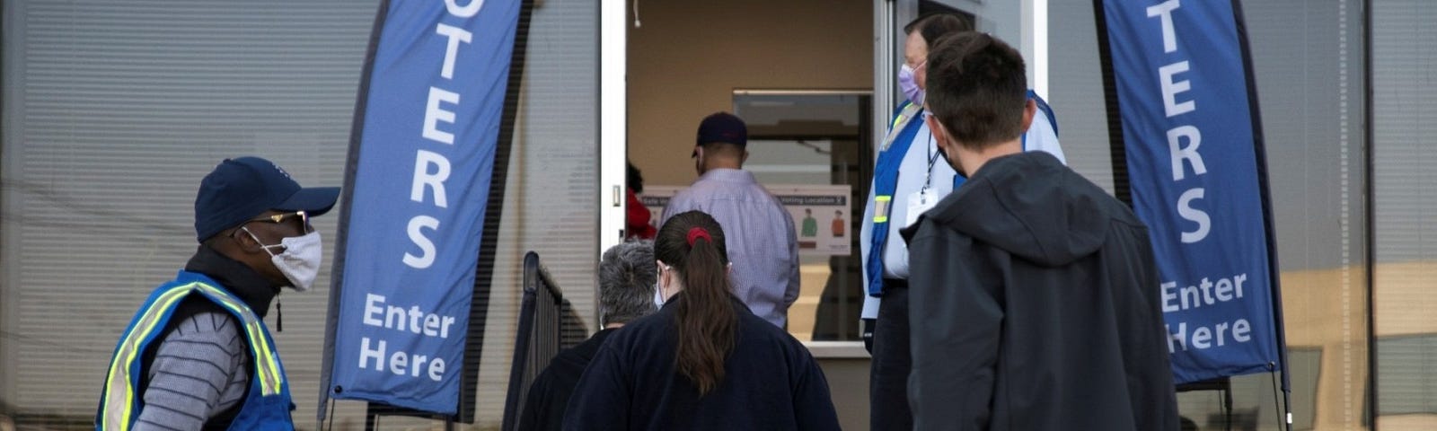 Voters line up to cast ballots as early voting begins in Cincinnati, Ohio, October 6, 2020. Photo by Megan Jelinger/Reuters