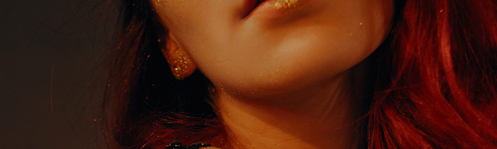 Beautiful woman with gold glitter — @LexNickels Poetry on Medium
