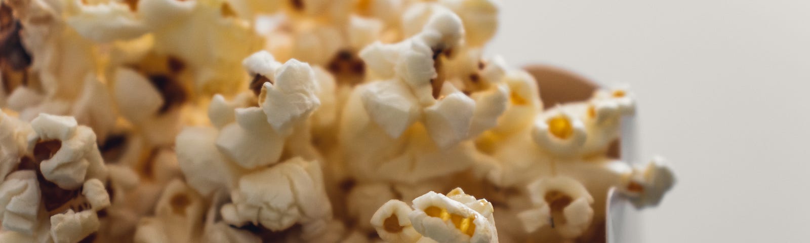 Popcorn in a popcorn box. It looks nom, and I would very much like some popcorn please (lol)