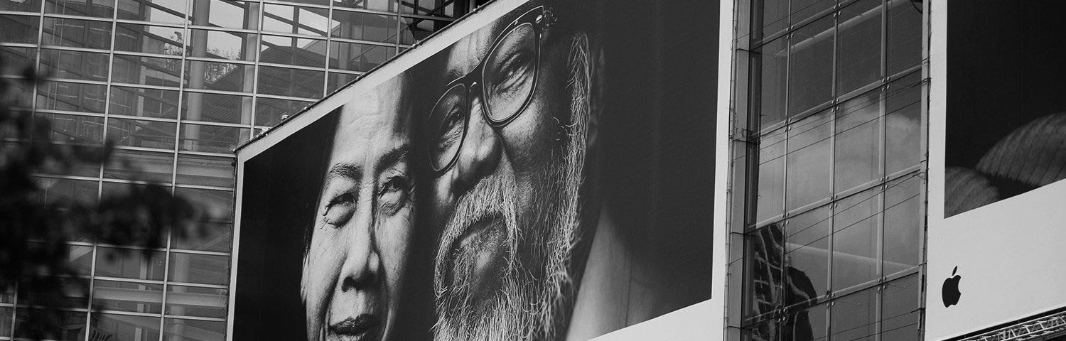 Two faces on a billboard