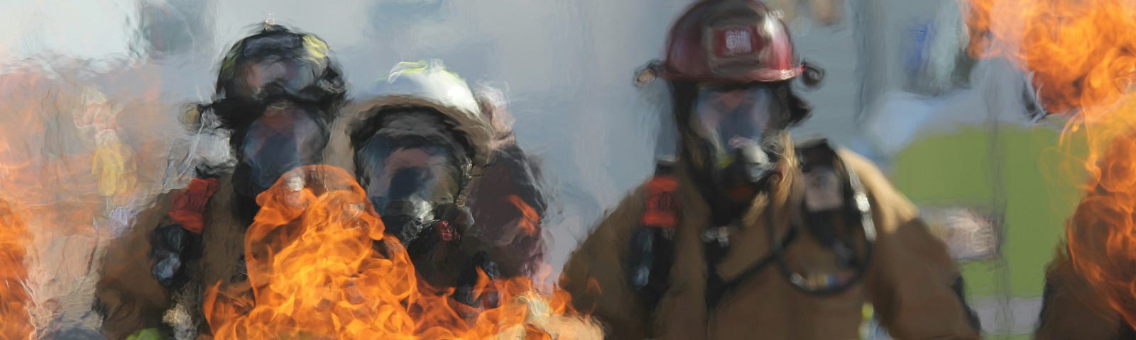 Firefighters with flames around the photo