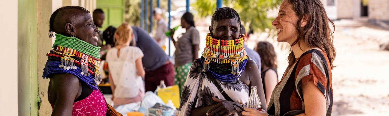 Sarah LeBaron von Baeyer, Director of Ethics and Engagement at Variant Bio (furthest right), at a project information session set up for community stakeholders during the 2023 Turkana Cultural Festival held in Lodwar, Kenya.