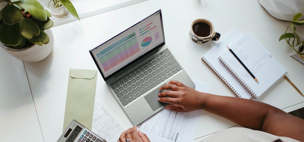 a business development manager working on her laptop