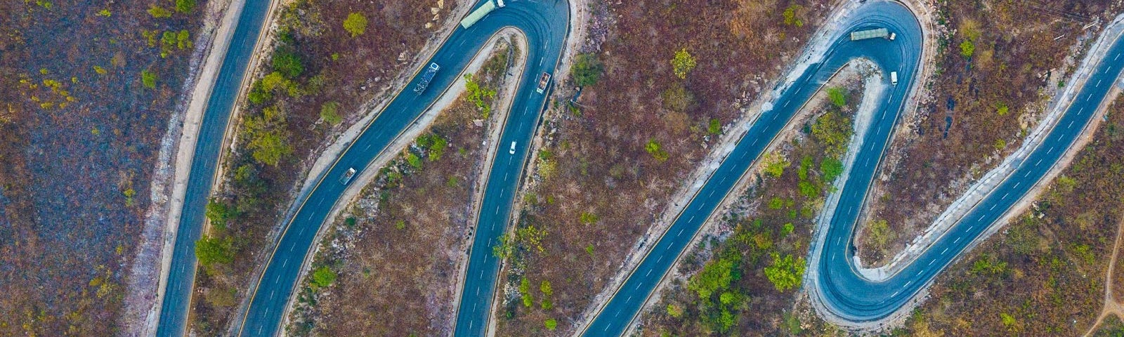 A long, winding, and unconventional road as seen from high above