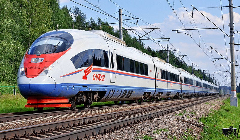 A Russian Railways Siemens Velaro Sapsan train English: The high-speed train EVS2–02 «Sapsan» on Moscow — Saint Petersburg railway line Author Sergey Korovkin 84 This file is licensed under the Creative Commons Attribution-Share Alike 3.0 Unported license.CC BY-SA 3.0 Deed | Attribution-Share Alike 3.0 Unported | Creative Commons File:ЭВС2–02.JPG — Wikimedia Commons