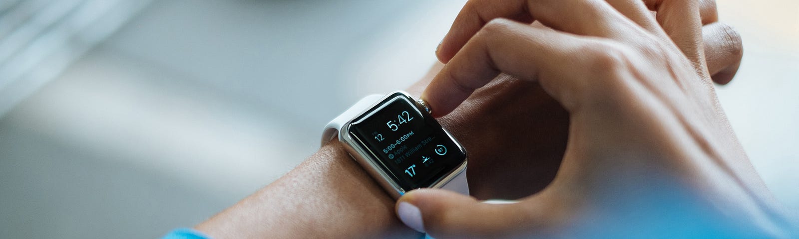 Close up of user adjusting Apple Watch bezel