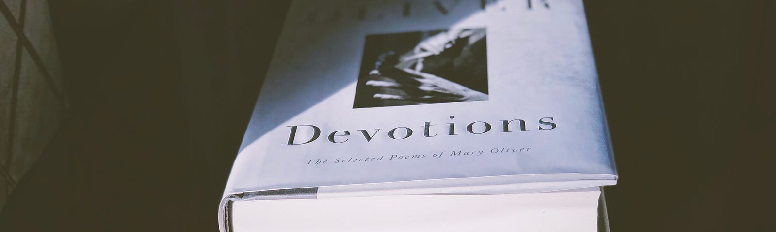 Photo of Mary Oliver’s book, Devotions.