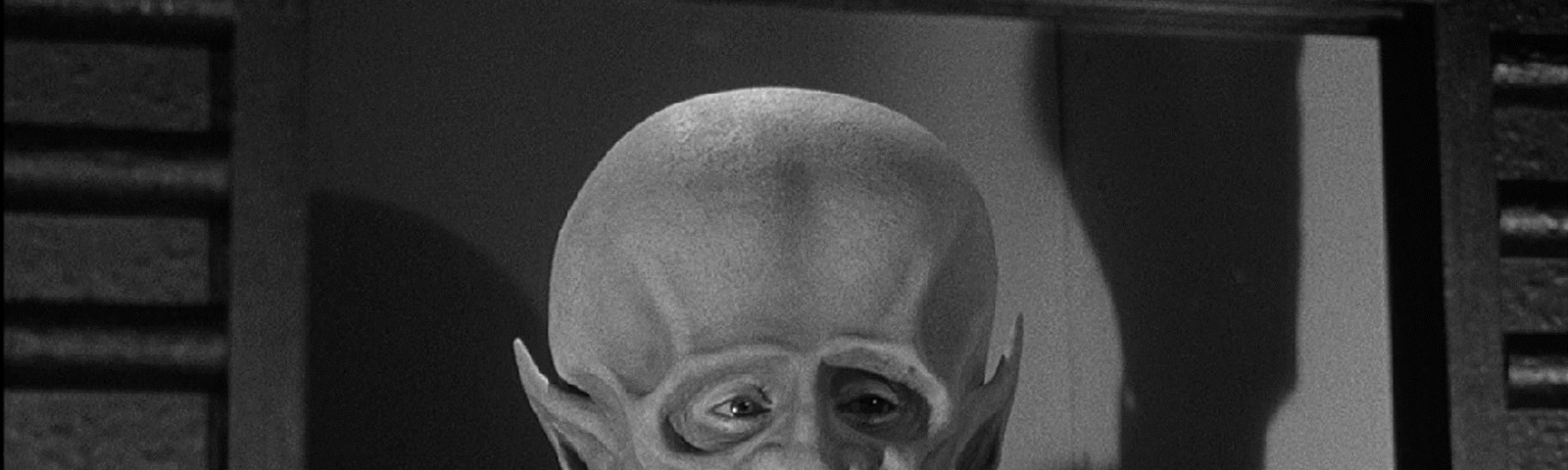 Old photo of a space alien with a huge head