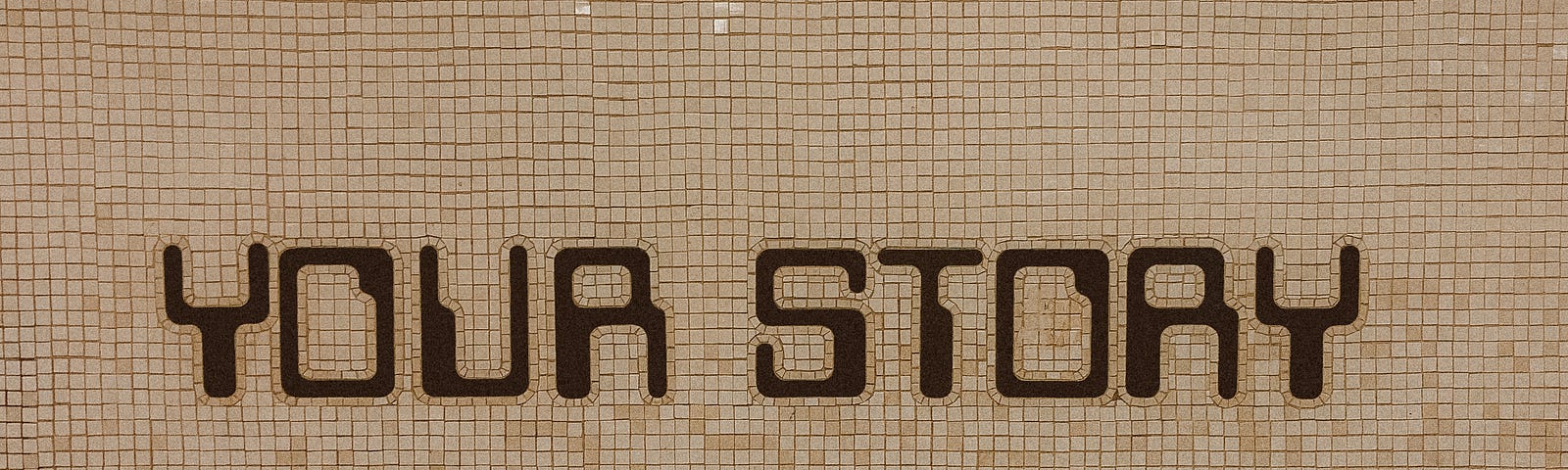 A tile floor with darkened tiles spelling out the words “your story”.