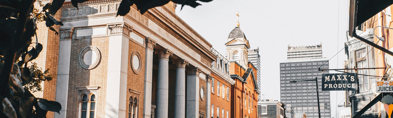 picture of a colonial brick building, possibly a bank or government building