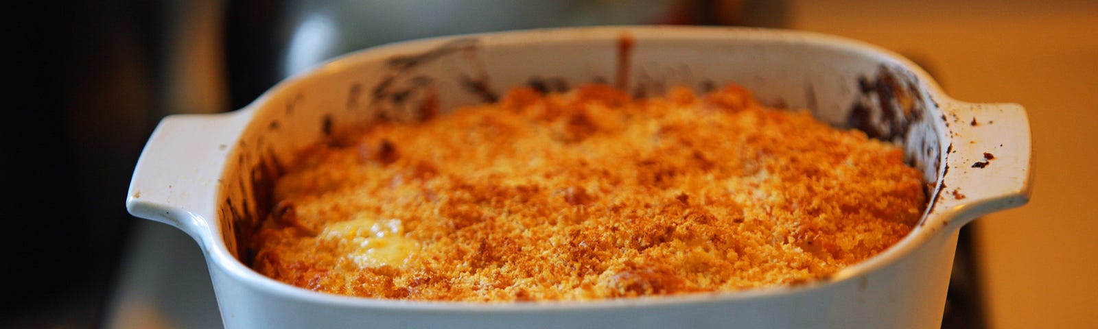 Photo of a small casserole dish of pumpkin casserole.