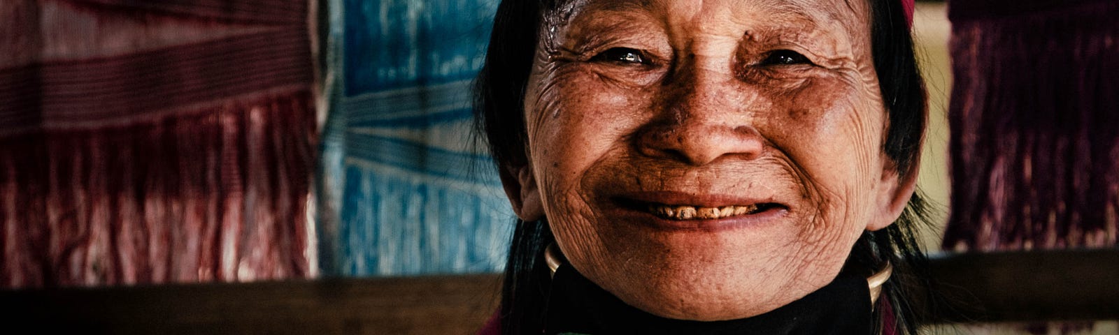 Asian Woman with elongated neck and neck rings