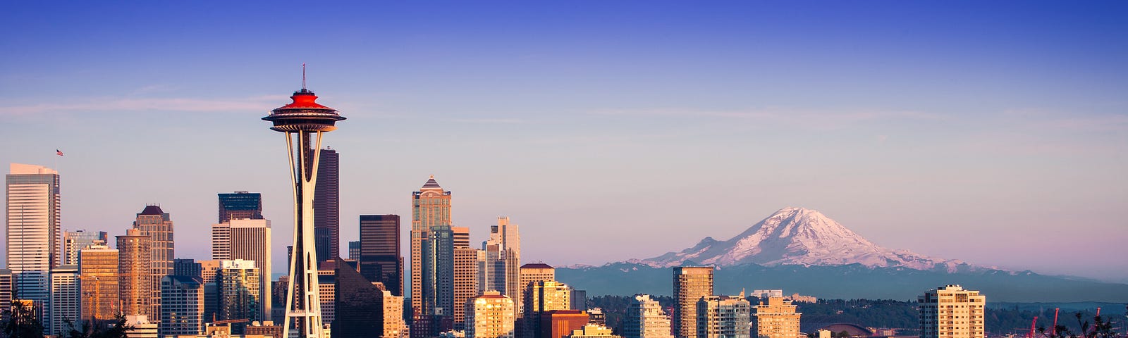 view of Seattle city skyline with Mount Baker in the background