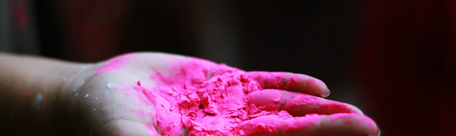 hand with pink paint
