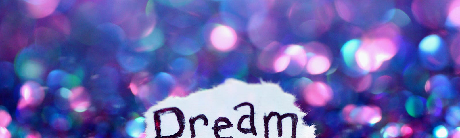 the word “Dream” with a colored background.
