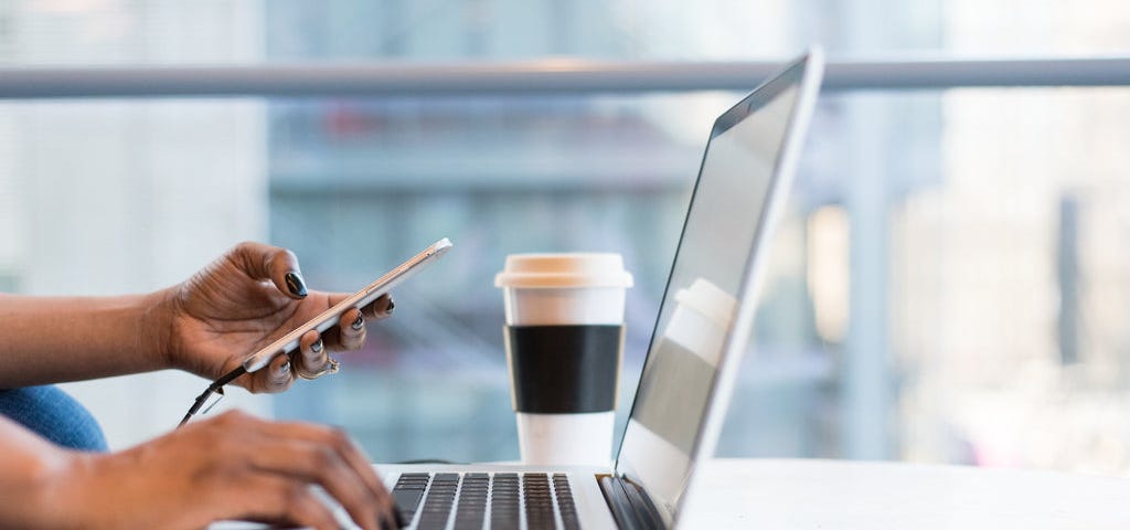 A lady working on a laptop