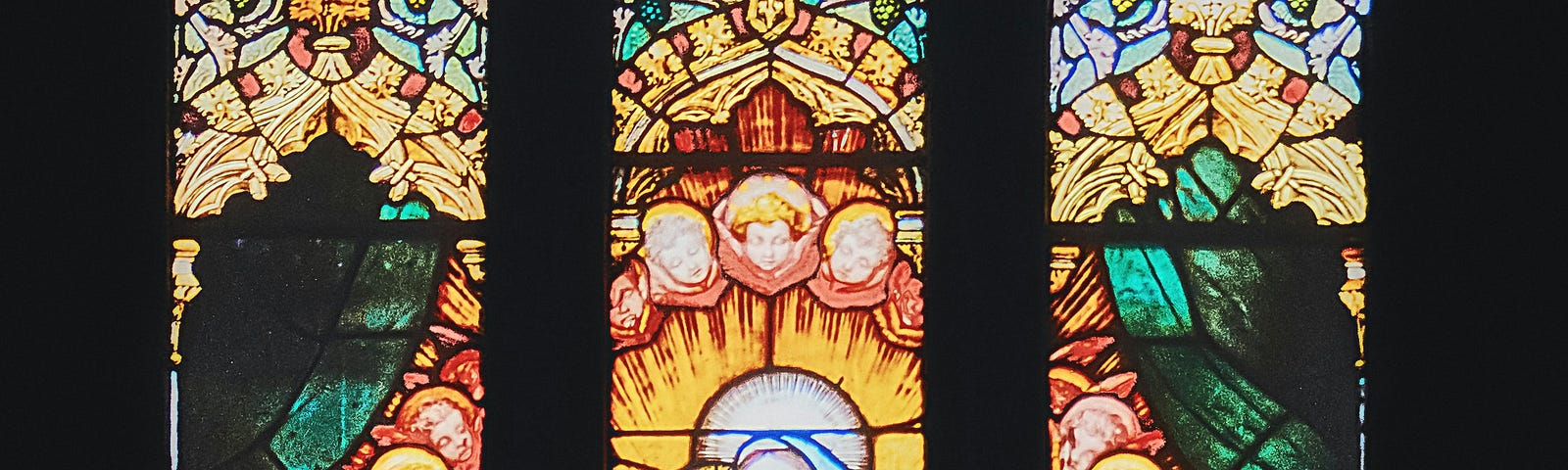 picture of stained glass window of the Madonna