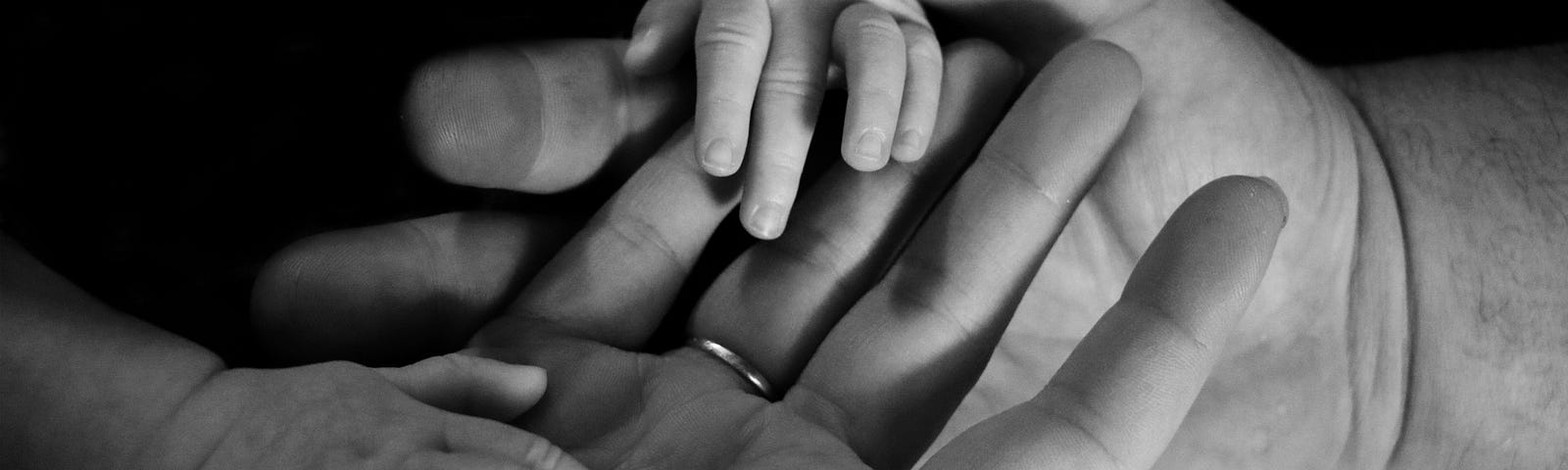 Hands — an anonymous picture of a family