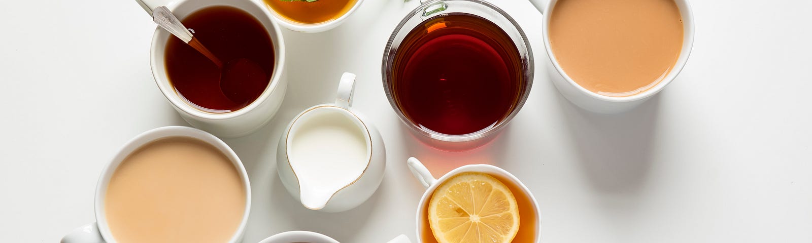 Image of several cups of tea that are different.