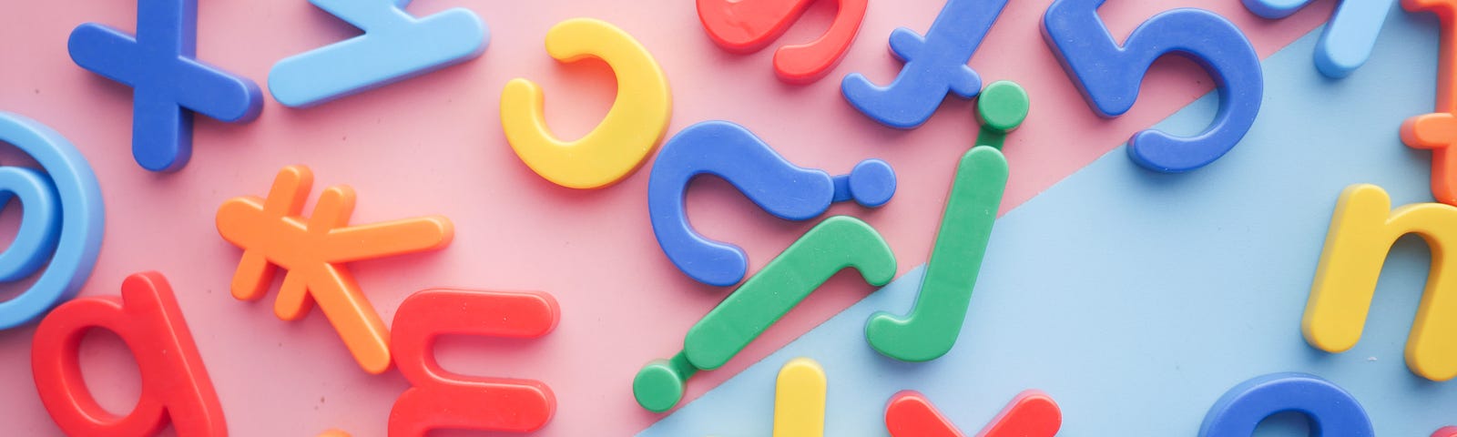 Colourful toy letters and symbols.
