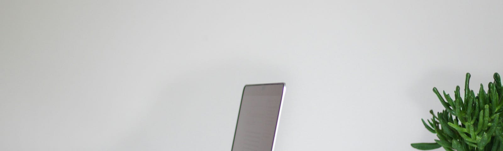 Hands typing on a computer